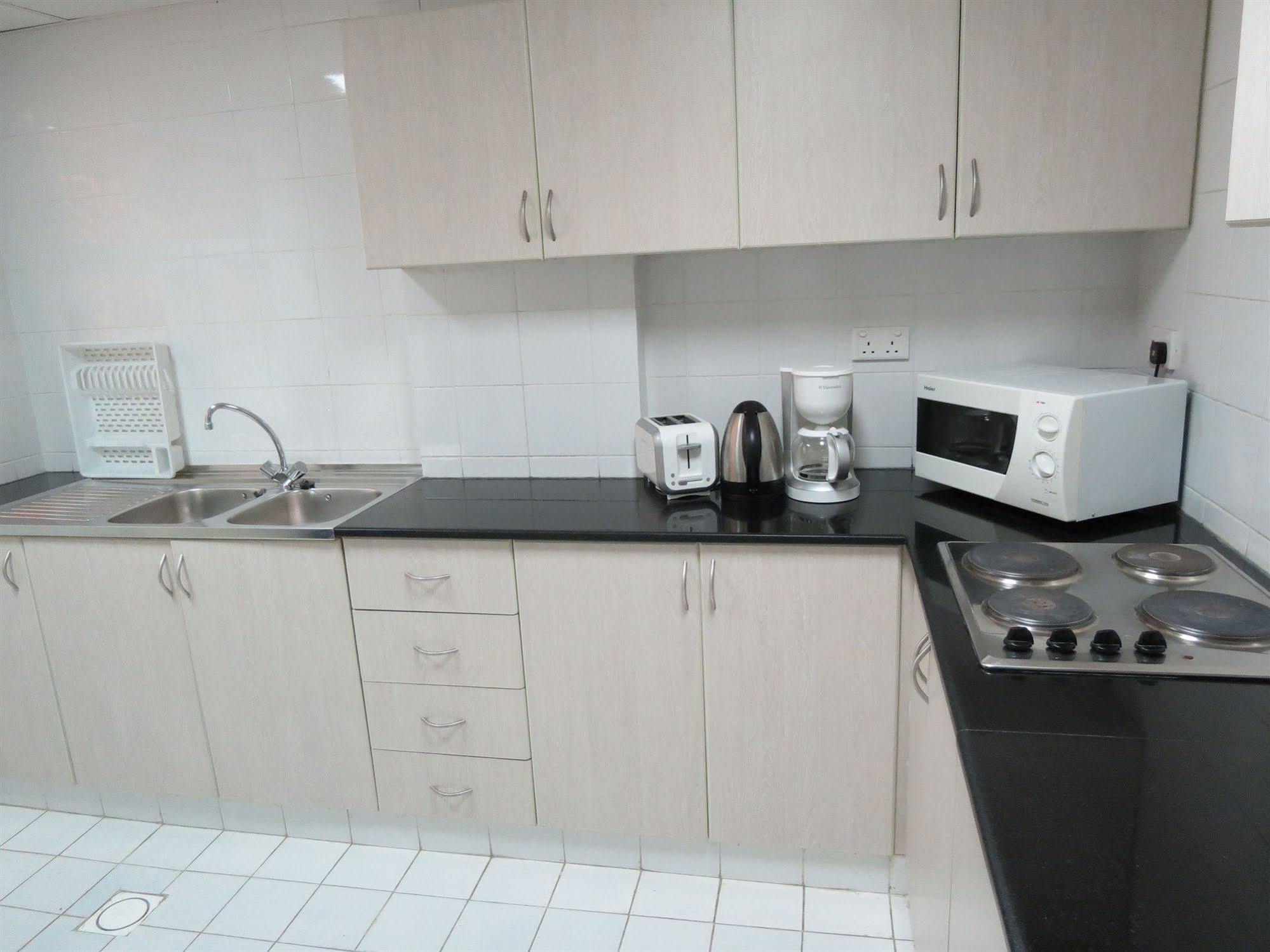 Midan Hotel Suites Маскат Экстерьер фото