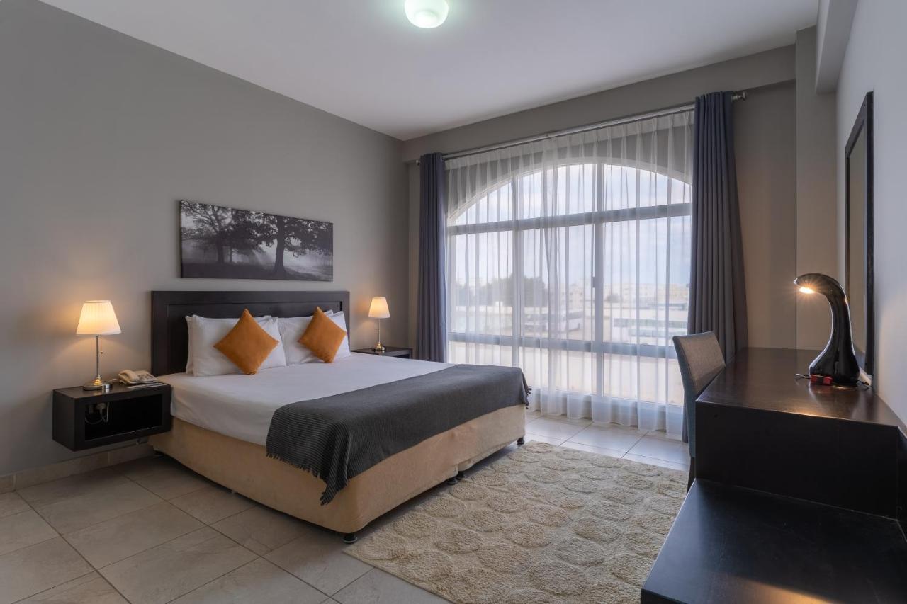 Midan Hotel Suites Маскат Экстерьер фото